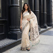 Classic Beige Muga Silk Saree with Floral Motifs - Saree Haveli Blue-Green